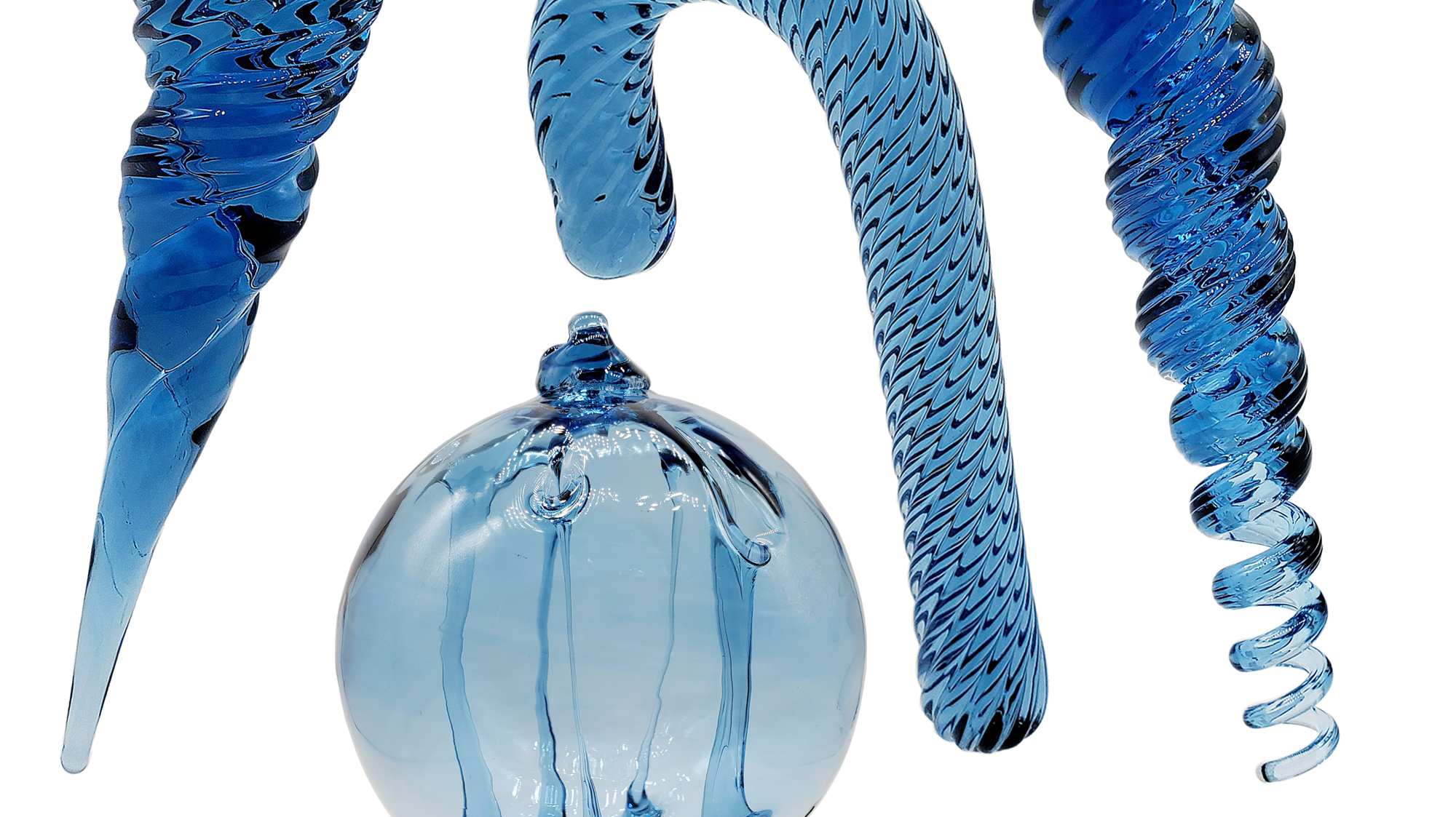 Recycled glass ornaments each individually handblown here in our studio. Recycled glass as we prepare it, always has a hue of blue that changes from batch to batch, and top of the tank to bottom.